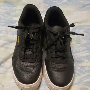 Puma Black Leather Platform Sneakers with White Sole and Gold Accent